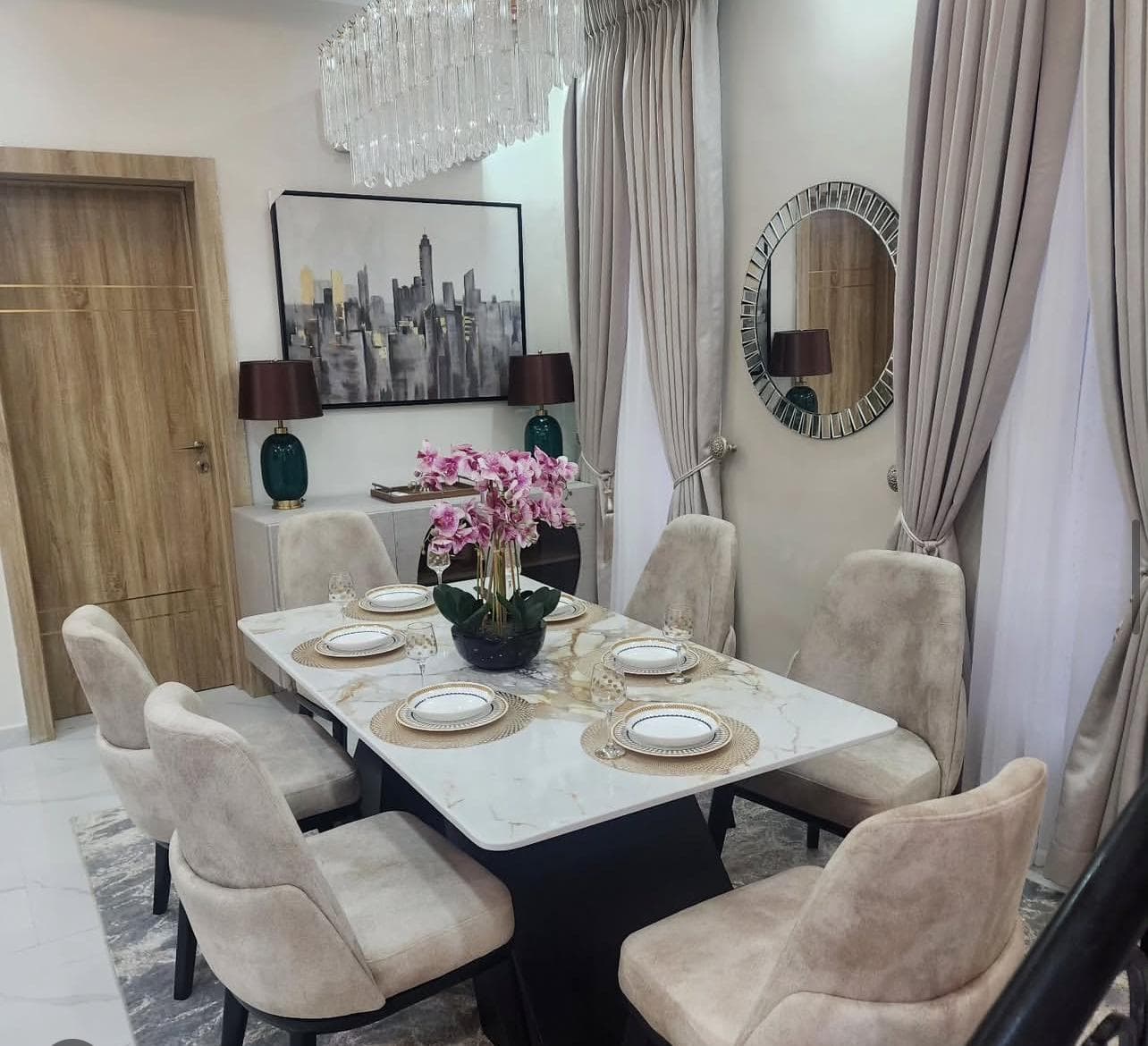 Orelo handcrafted luxury marble and dark wood dining suite with bespoke craftsmanship